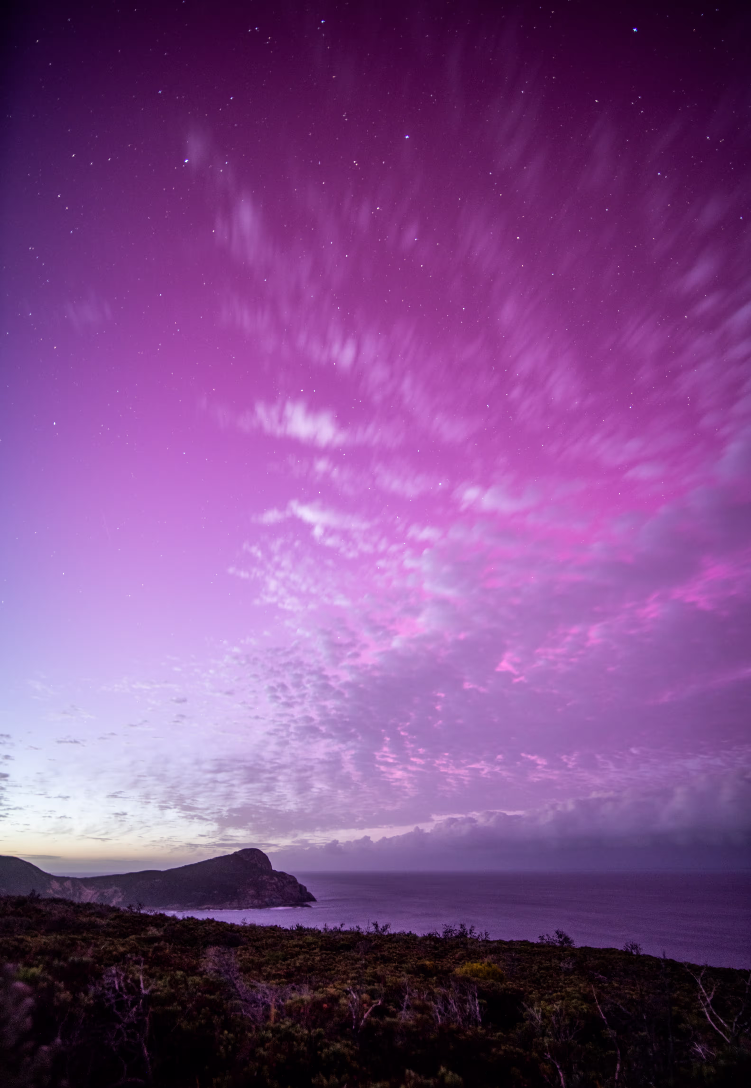 Sunrise creeping into the Southern lights 